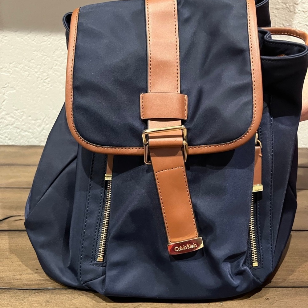 Calvin Klein Blue and Tan Backpack with Durable Design